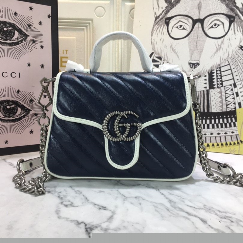 G*u*i top handle bags